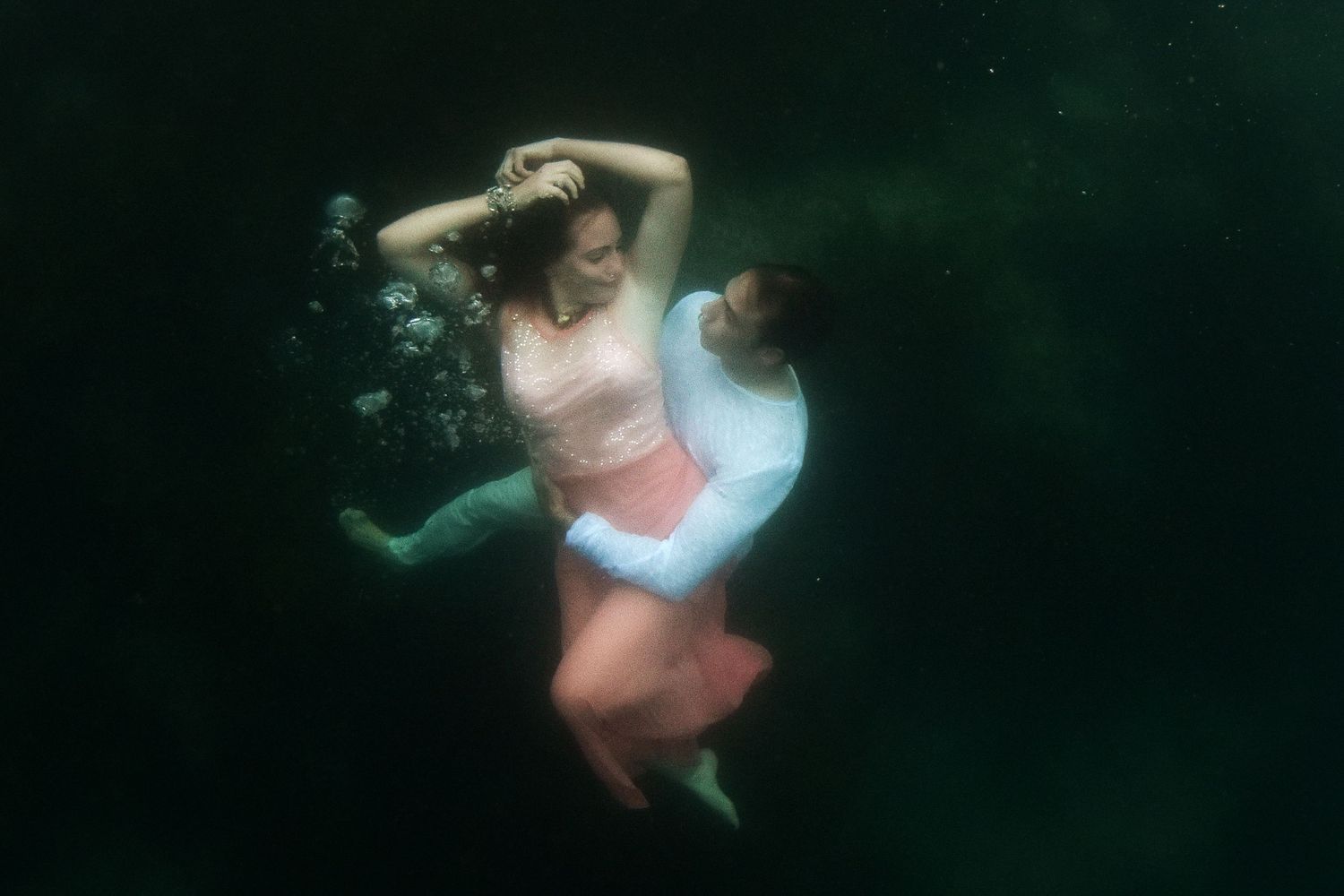 Authentic, storytelling editorial portrait underwater photography capturing real moments with depth, emotion, and a strong visual narrative