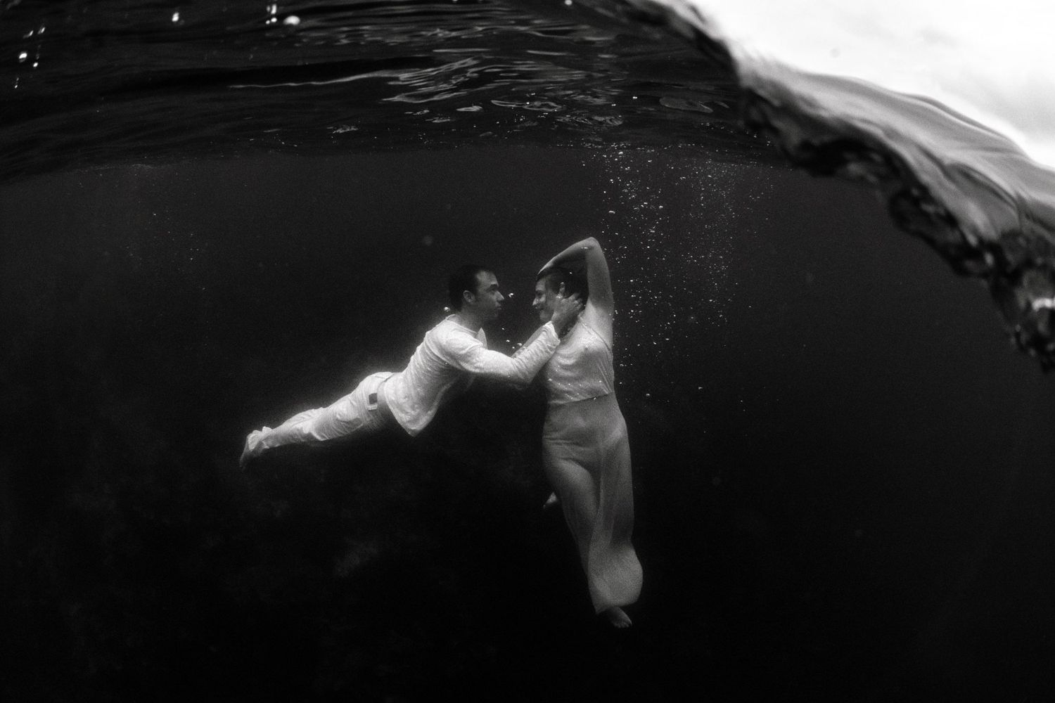 Authentic, storytelling editorial portrait underwater photography capturing real moments with depth, emotion, and a strong visual narrative