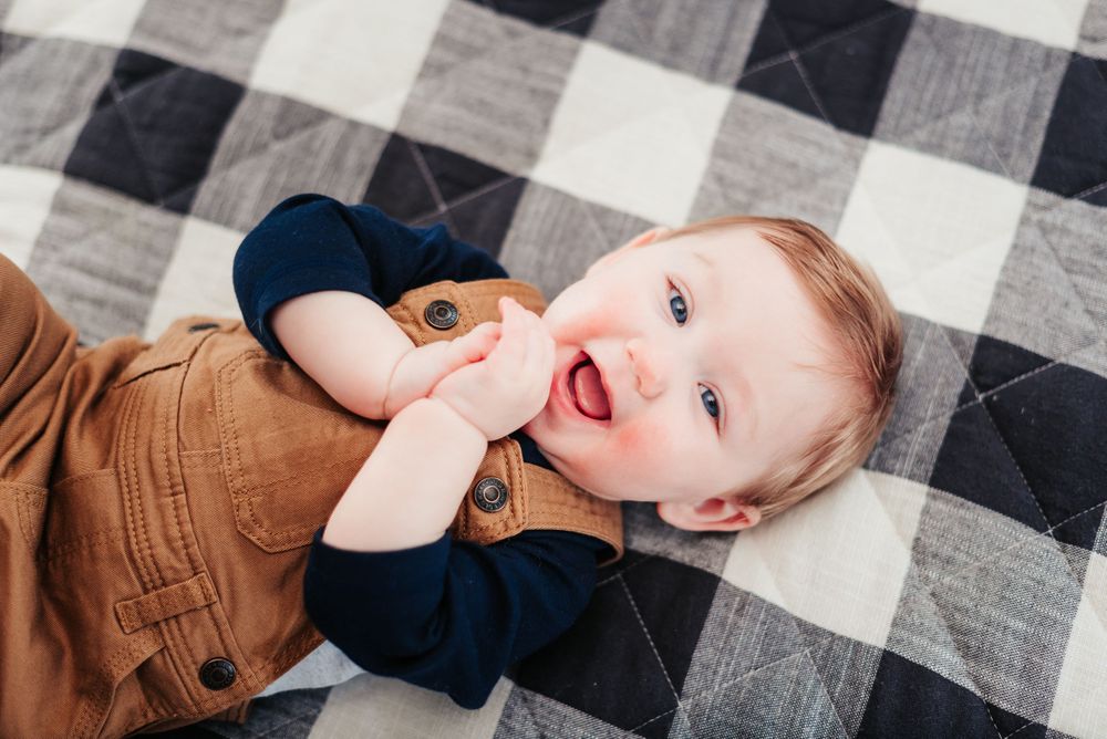 twin boys posing for 6 month photo session in indiana