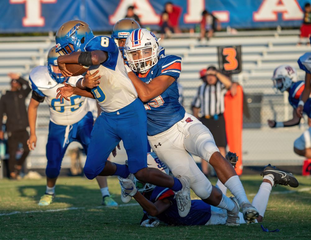 Football action picture by Alpha Collective Sports Photo & Film Co. Graham, NC Southeast Alamance High School