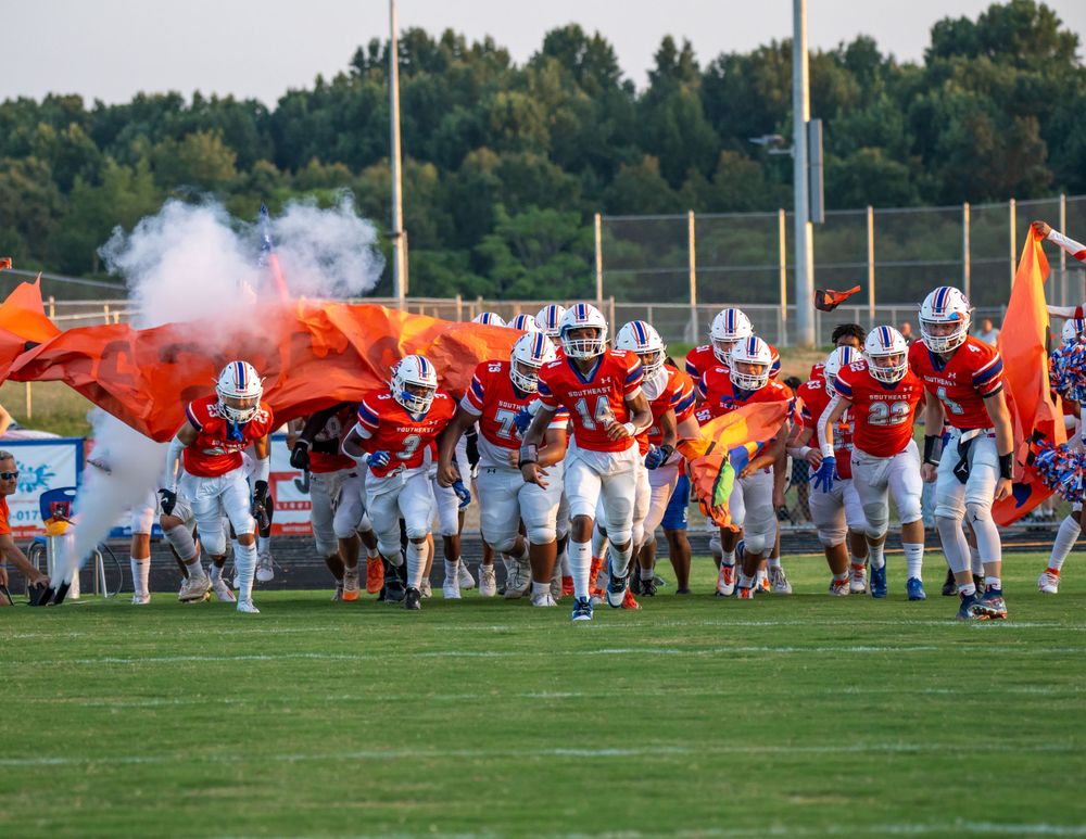Football action picture by Alpha Collective Sports Photo & Film Co. Graham, NC Southeast Alamance High School