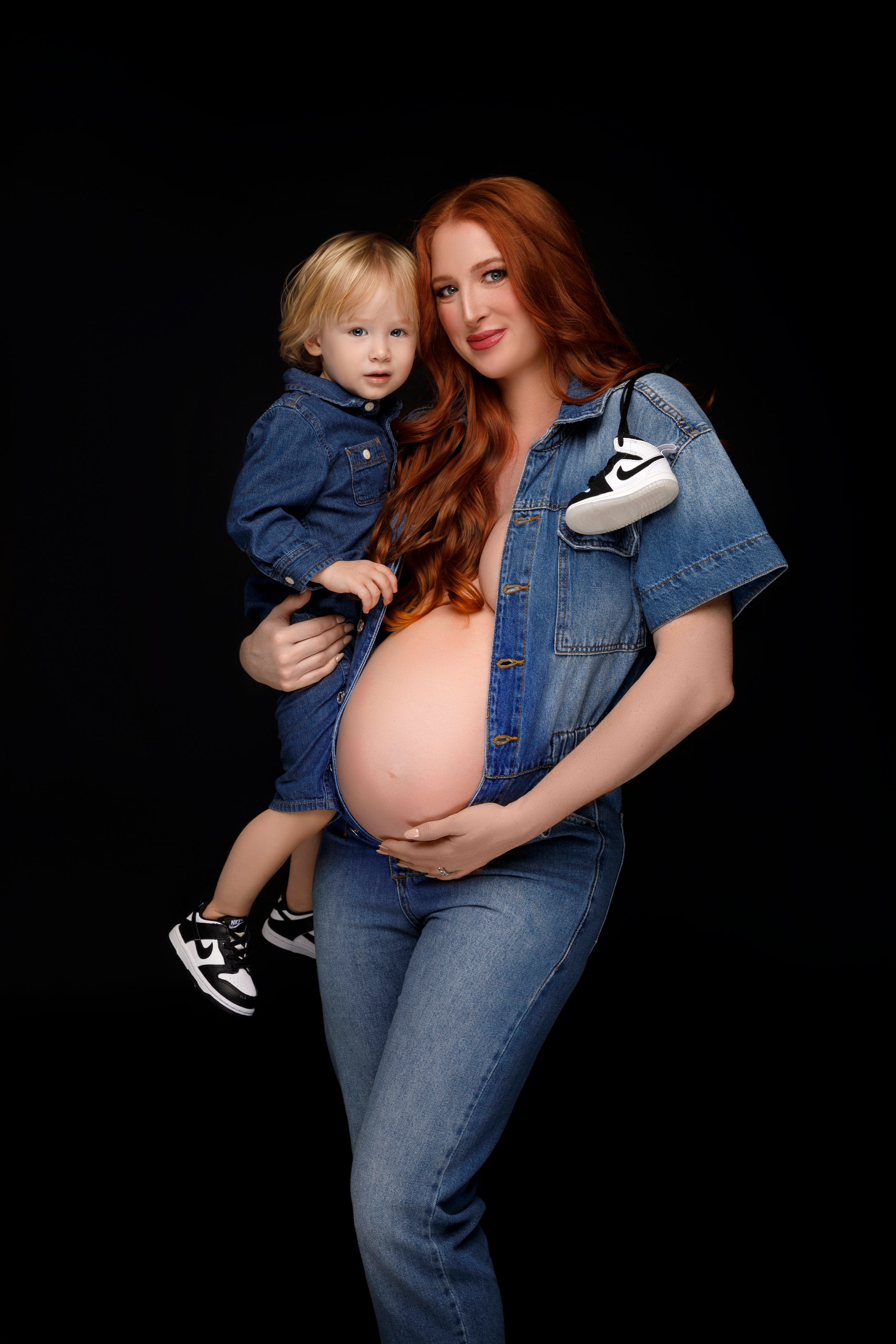 San Diego studio Mommy and Me session, a redhead model wearing a denim jumpsuit, captured by Daryana Orange.