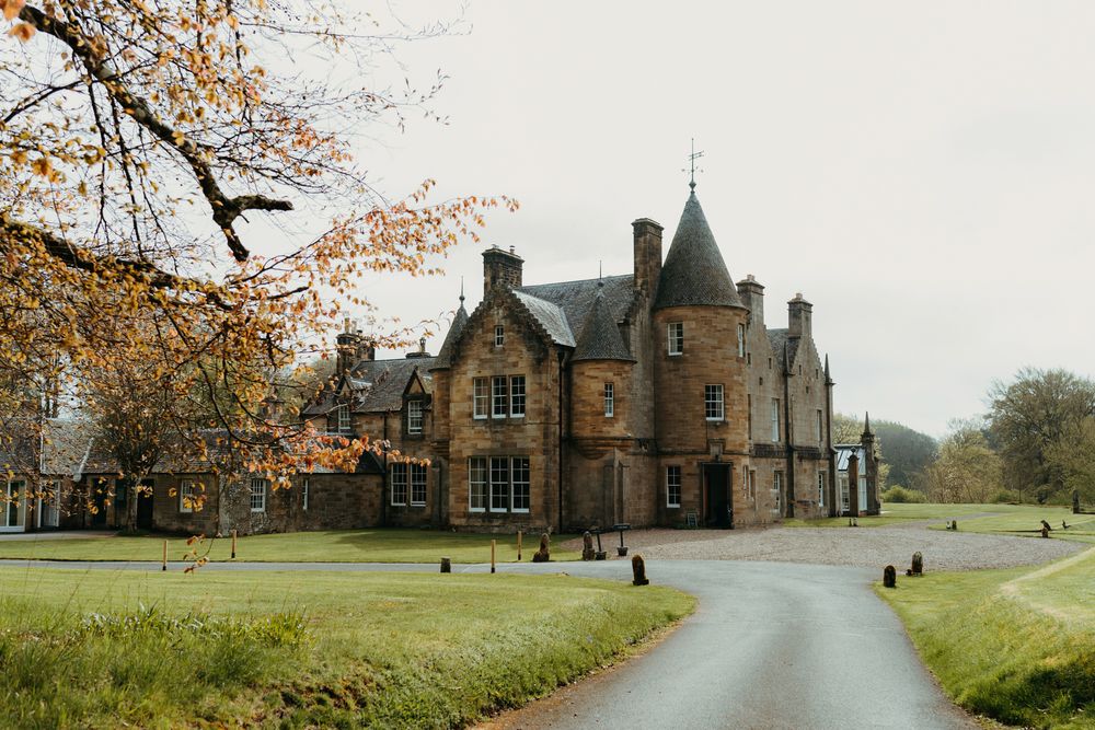 Stunning Scottish castle with Victorian architecture serves as elegant wedding venue.
