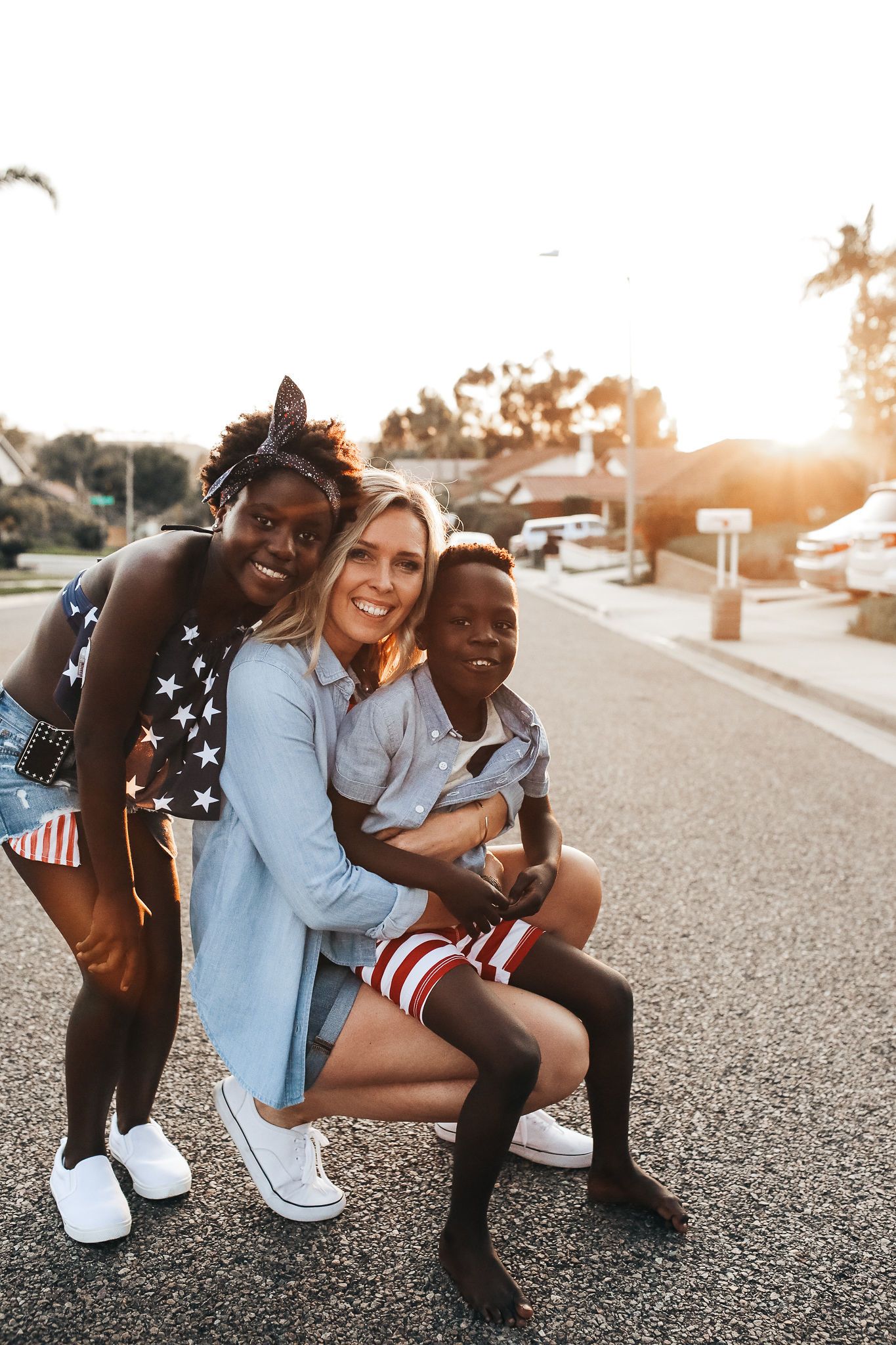 mom and children at sunset