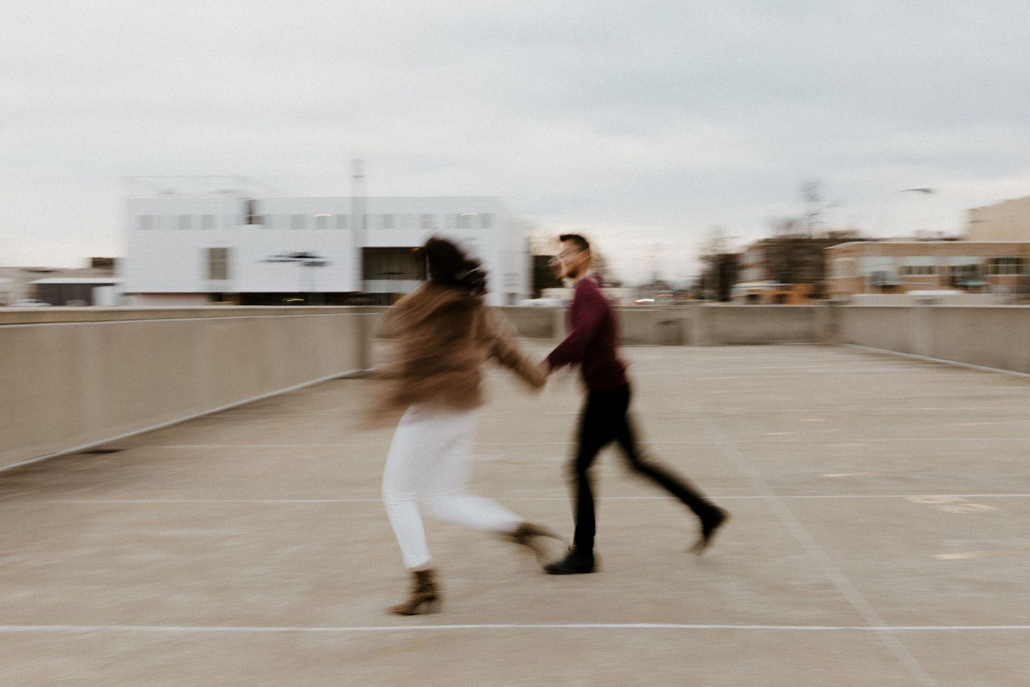 Lifestyle couples portrait in Joplin, Missouri with movement-focused posing and intimate storytelling.