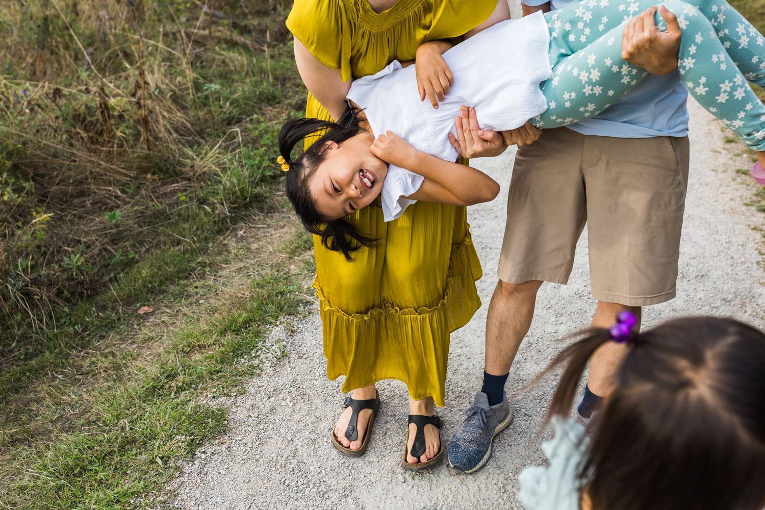 Redmond Family Photographer capturing candid moment of family playing with niece