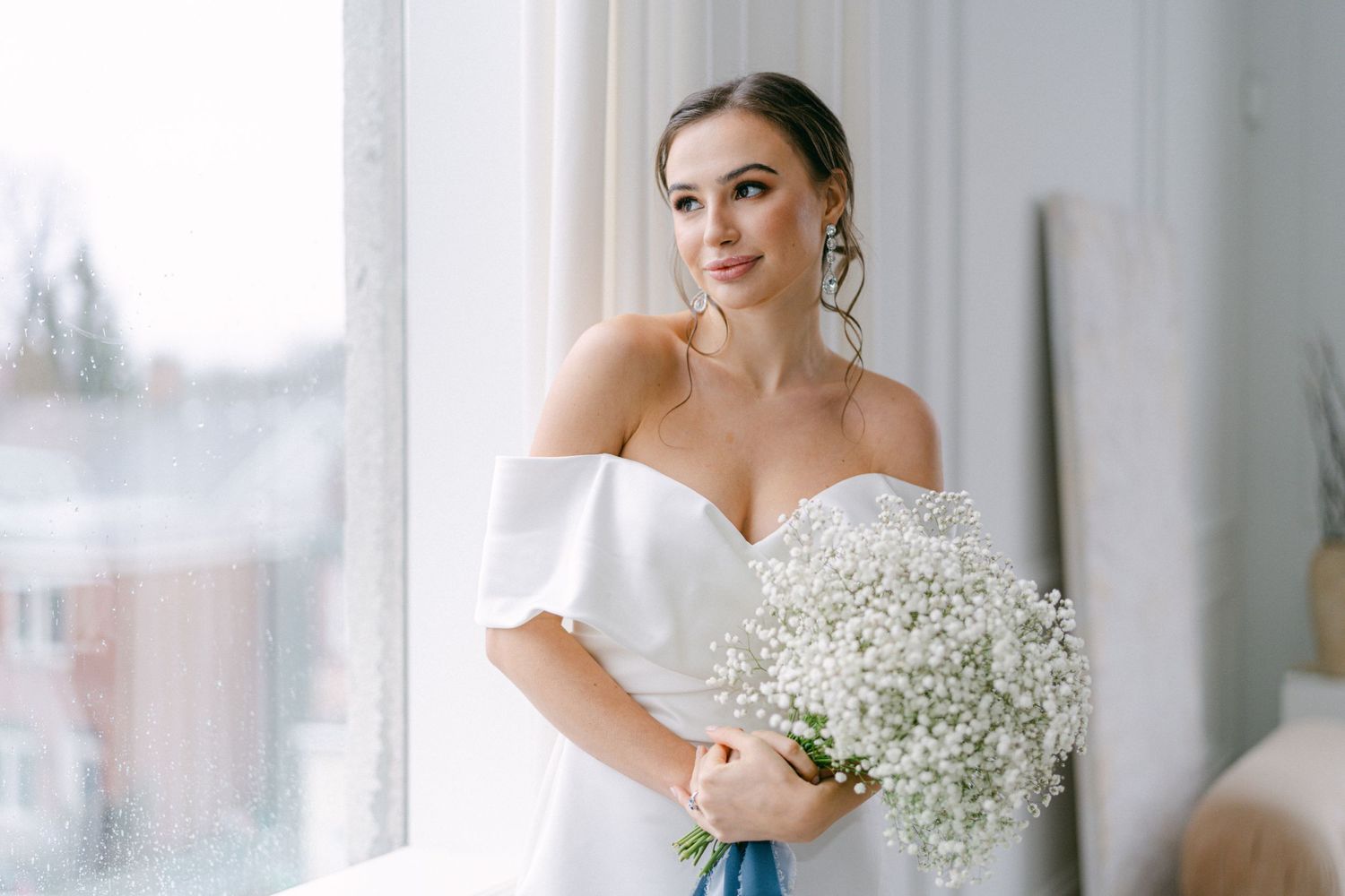 Bride Looking Out A Window