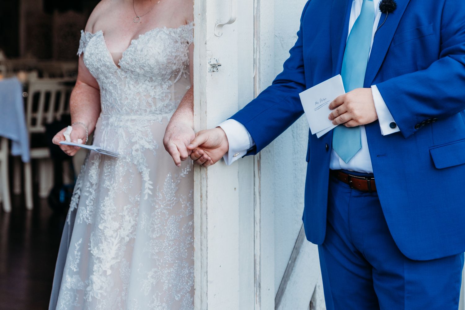 Bride & Groom share a first touch and private vow exchange at The White Barn at Lucas Farms in Oakland, MD