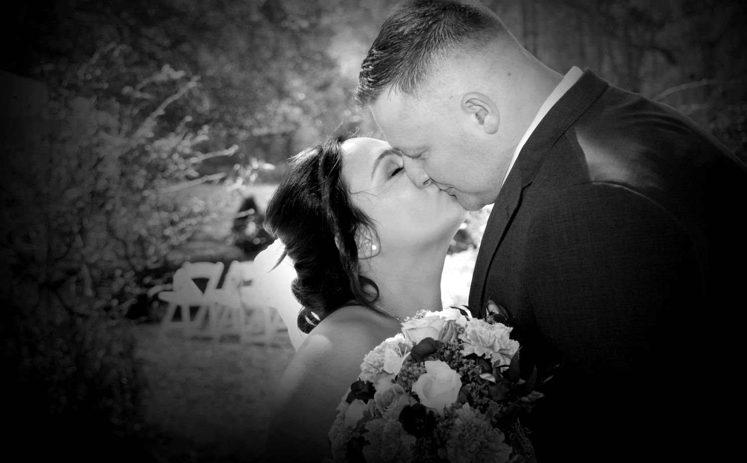 Bride and Groom having an intimate kiss at their wedding in Warwickshire