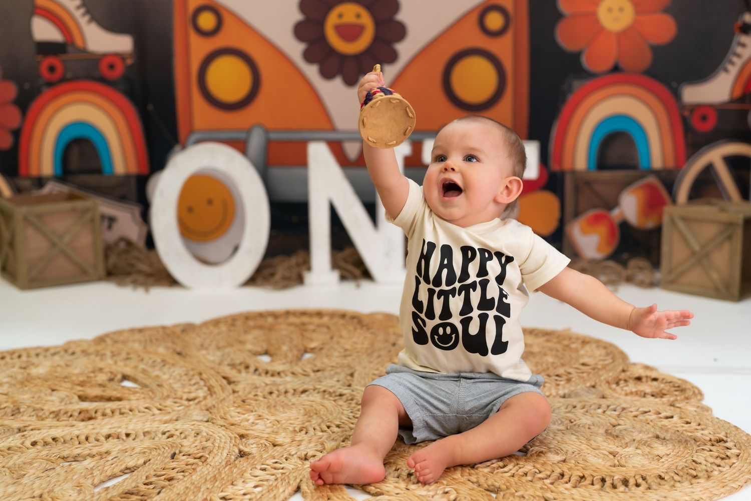 Groovy ONE 1st birthday cake smash session in a Bothell studio. Fun, authentic birthday photography by Filling the Frame Photography