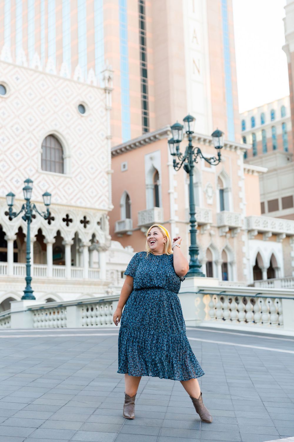 Dancing movement captured against the ornate architectural backdrop of The Venetian hotel in Las Vegas.