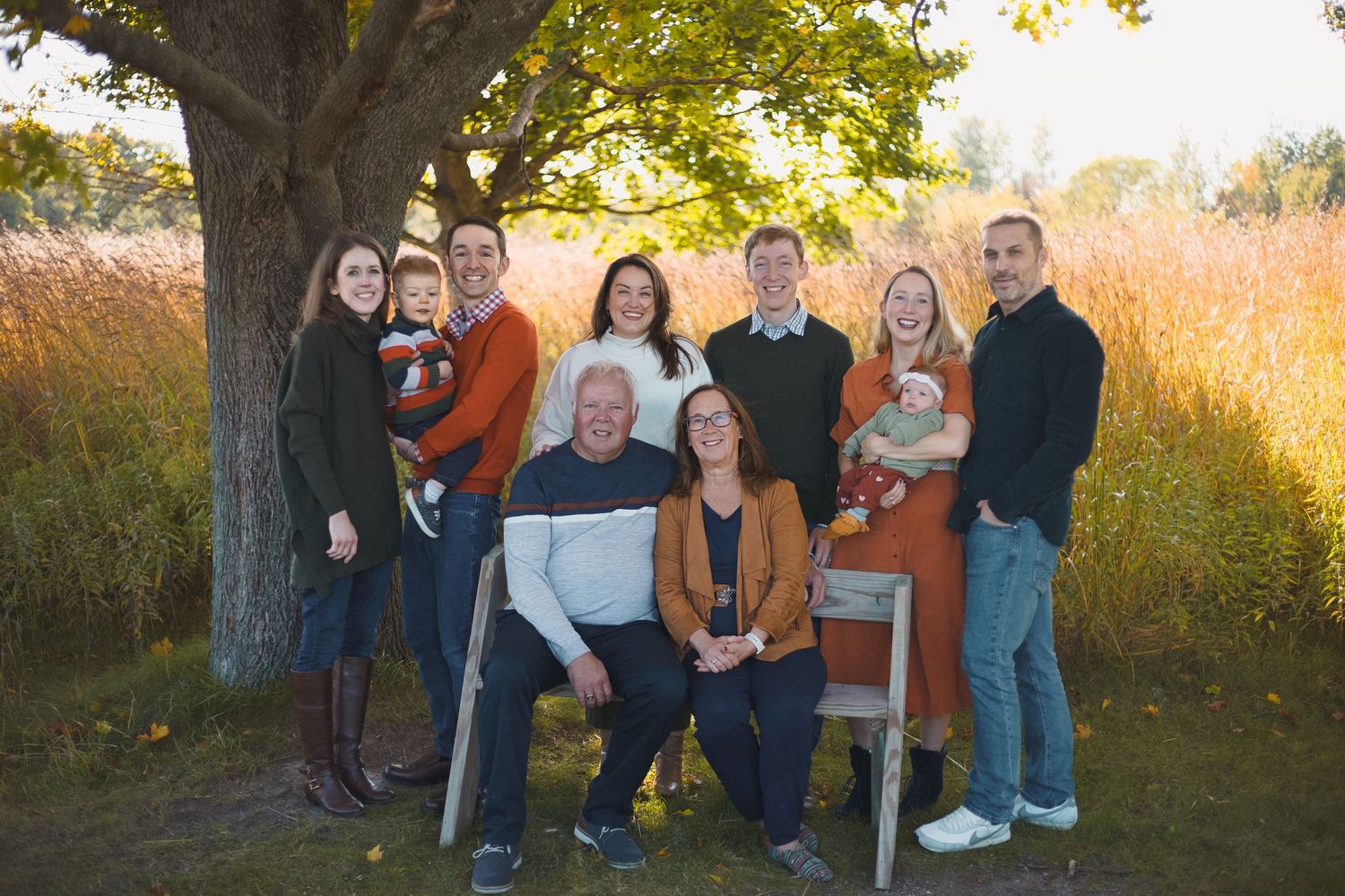 large multi generational family portrait on bench under tree maywood sheboygan wi