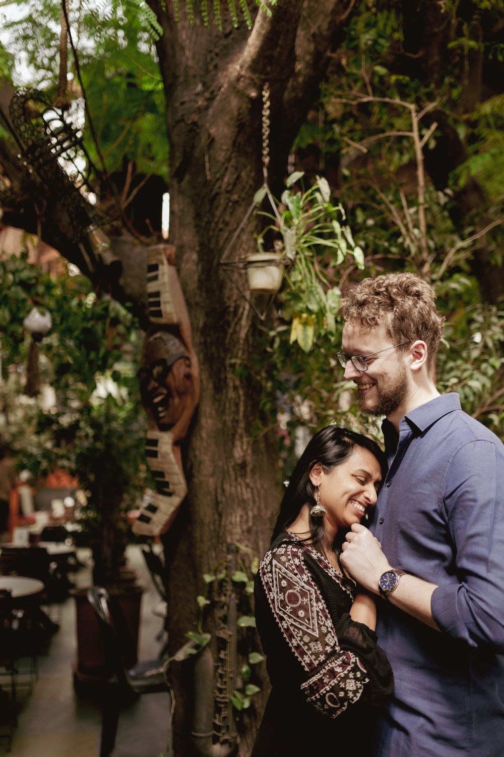 A couple embracing during their couple shoot at Sheesha Cafe, Pune