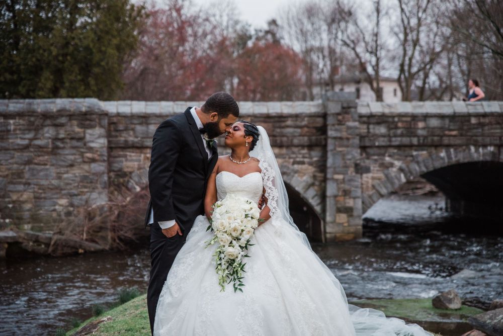 bride and groom kiss portrait