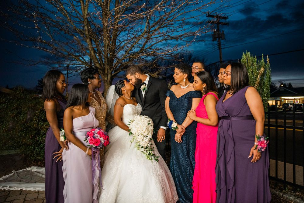 family portrait with bride and groom