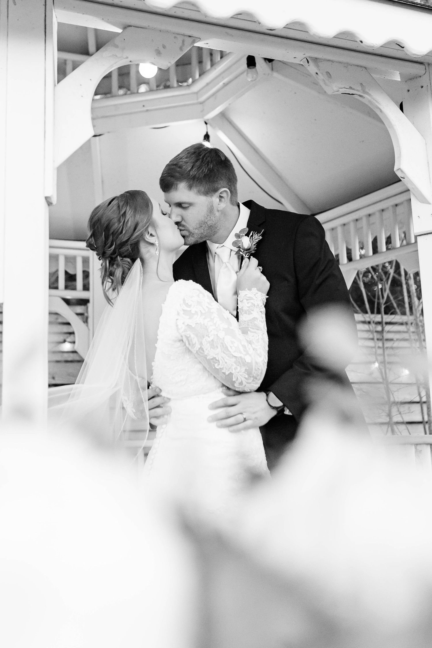 bride and groom kiss