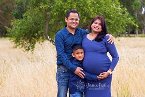indian family mom dad big brother pregnancy portrait grass and tree utah valley
