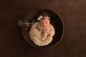 newborn portrait art cozy pajamas brown simple bowl spanish fork