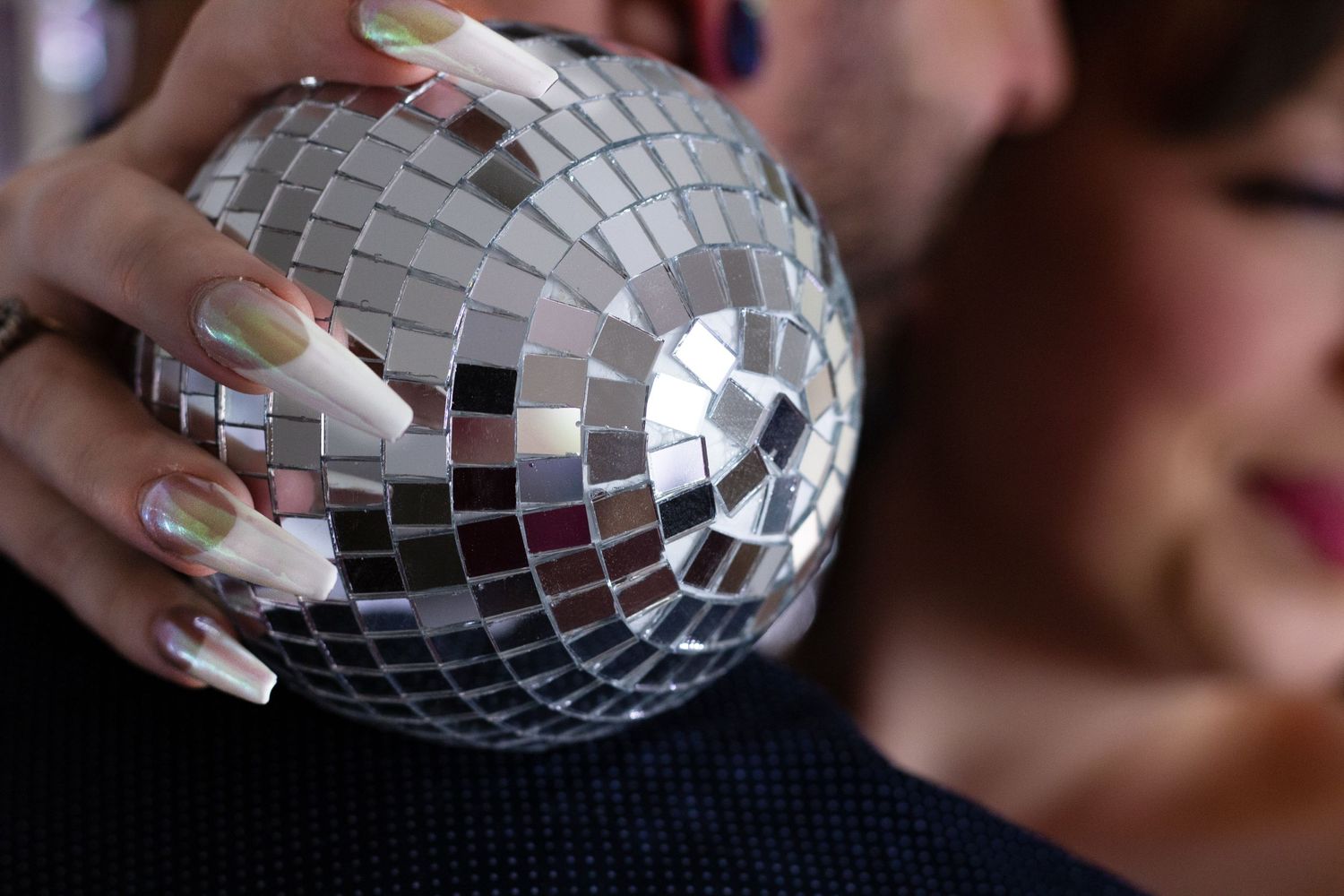 Image taken of couple with the theme, Disco Love. Taken in Sugarhouse, Utah.