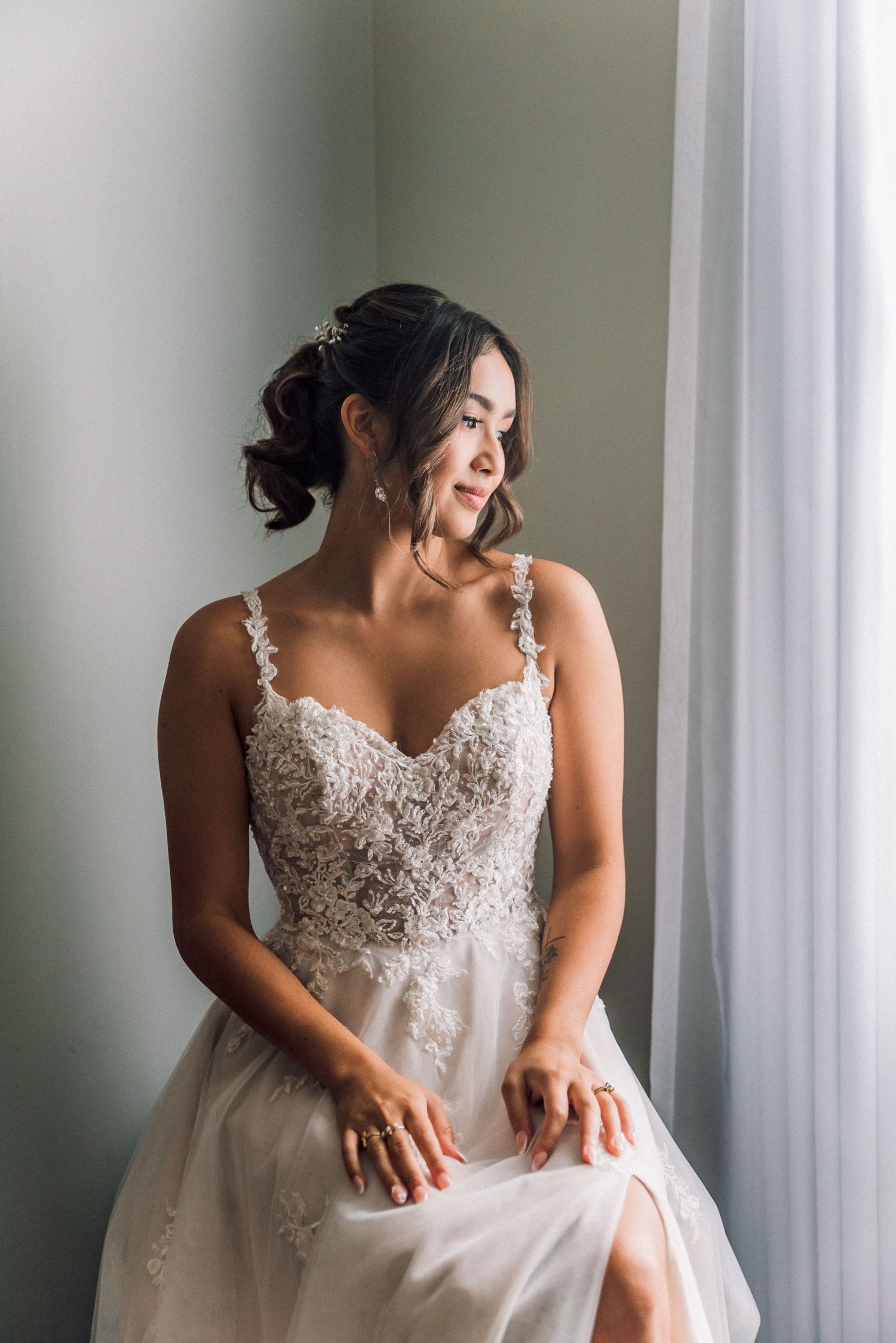 bride getting ready at hotel a beautiful catholic wedding ceremony at the Basilica of Our Lady Immaculate church Guelph