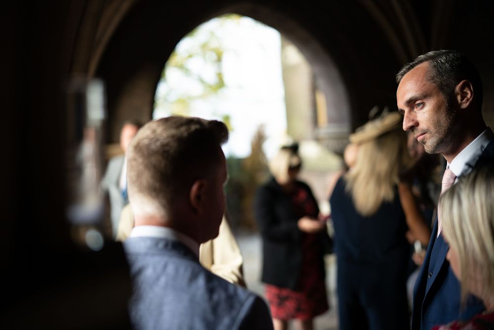 wedding guests inside the arches of st stephens church Hampstead