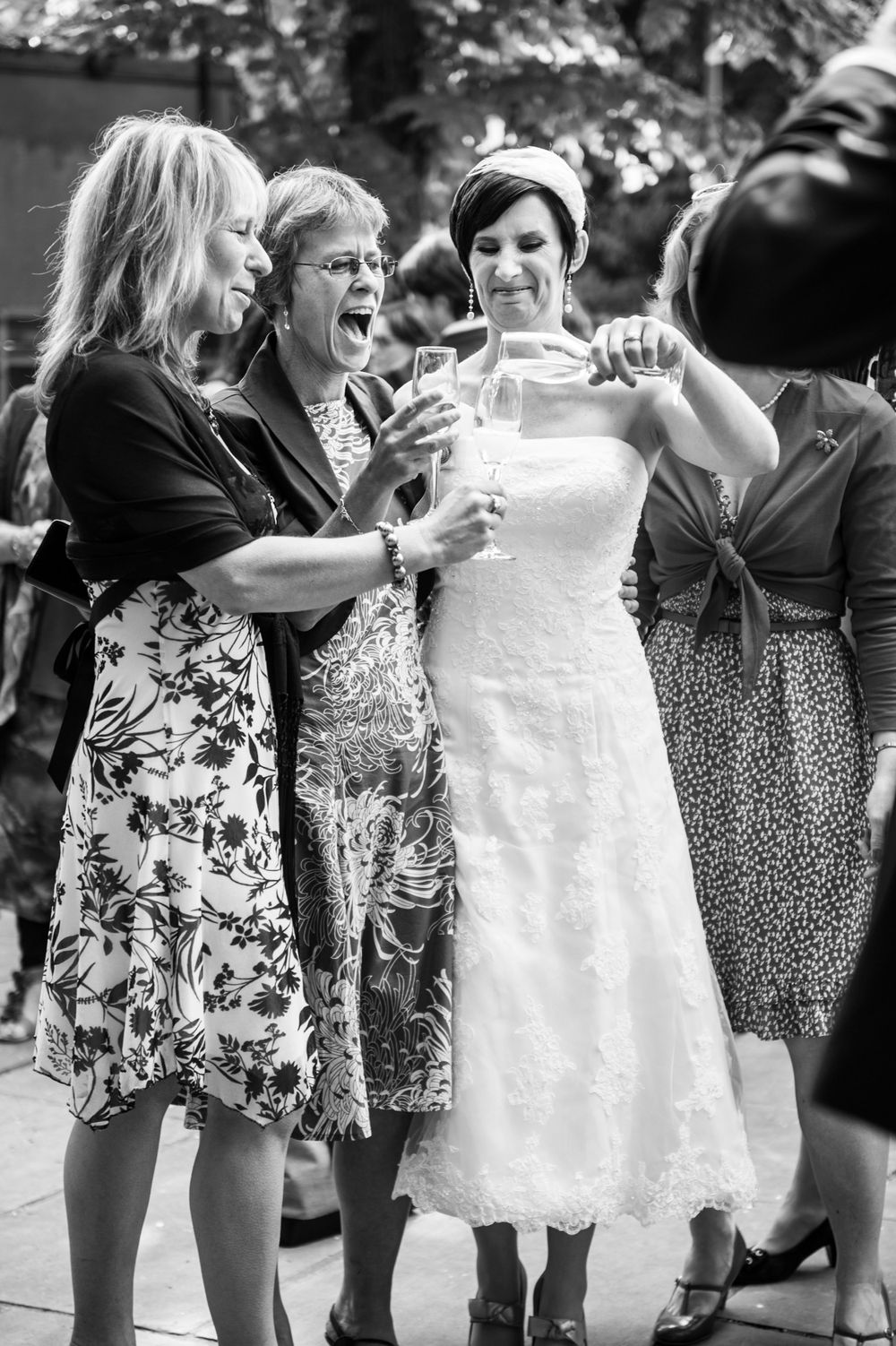 bride with wedding guests outside st stephens church Hampstead