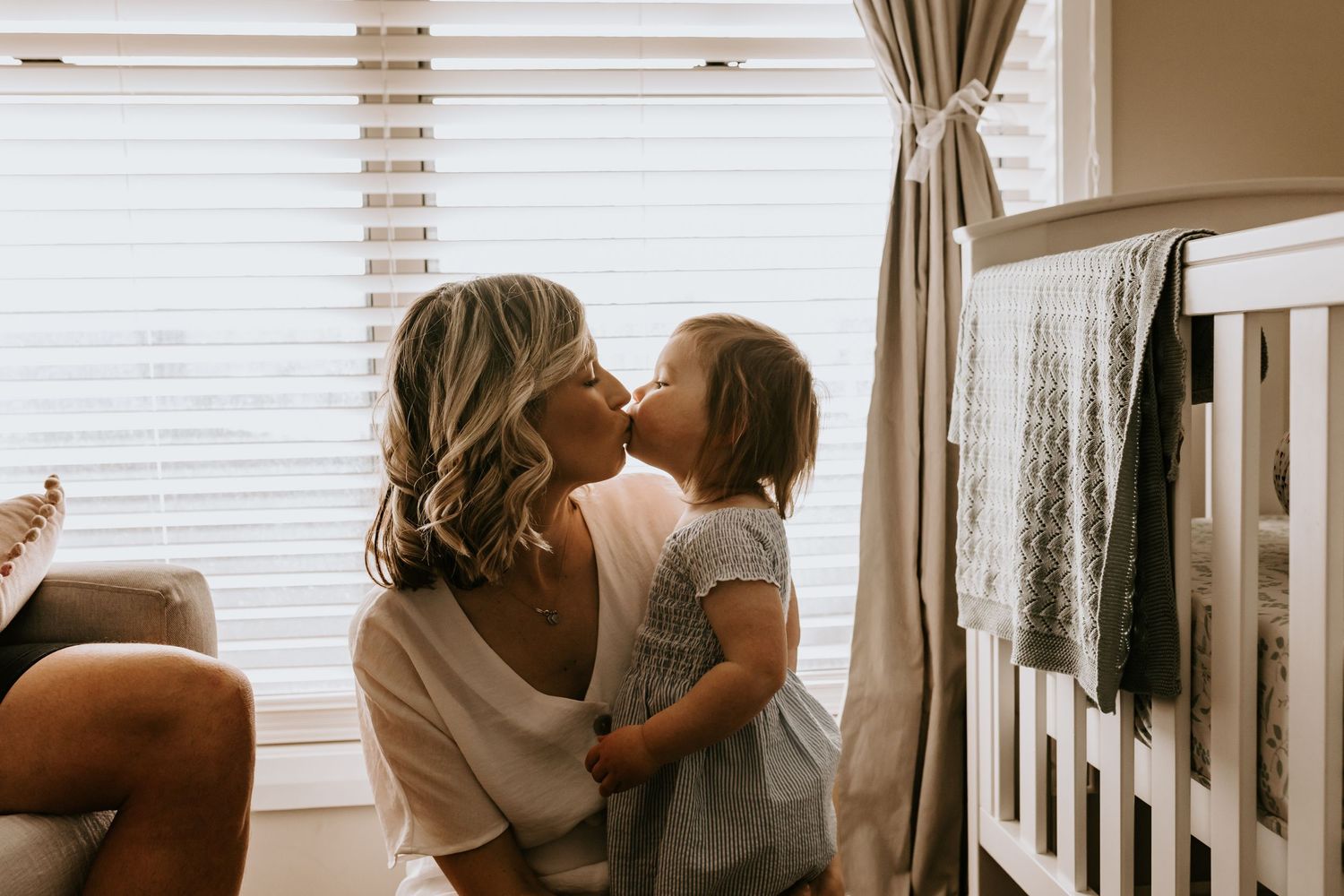 Collection of lifestyle family photos showing genuine connections in a nursery setting.
