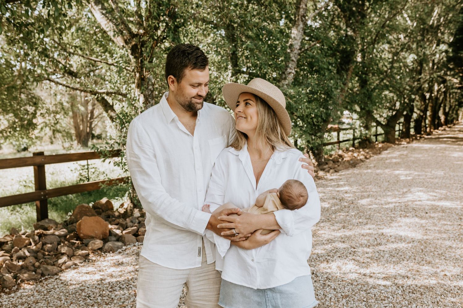 Multiple outdoor family portraits showing intimate moments against a sun-dappled forest backdrop.