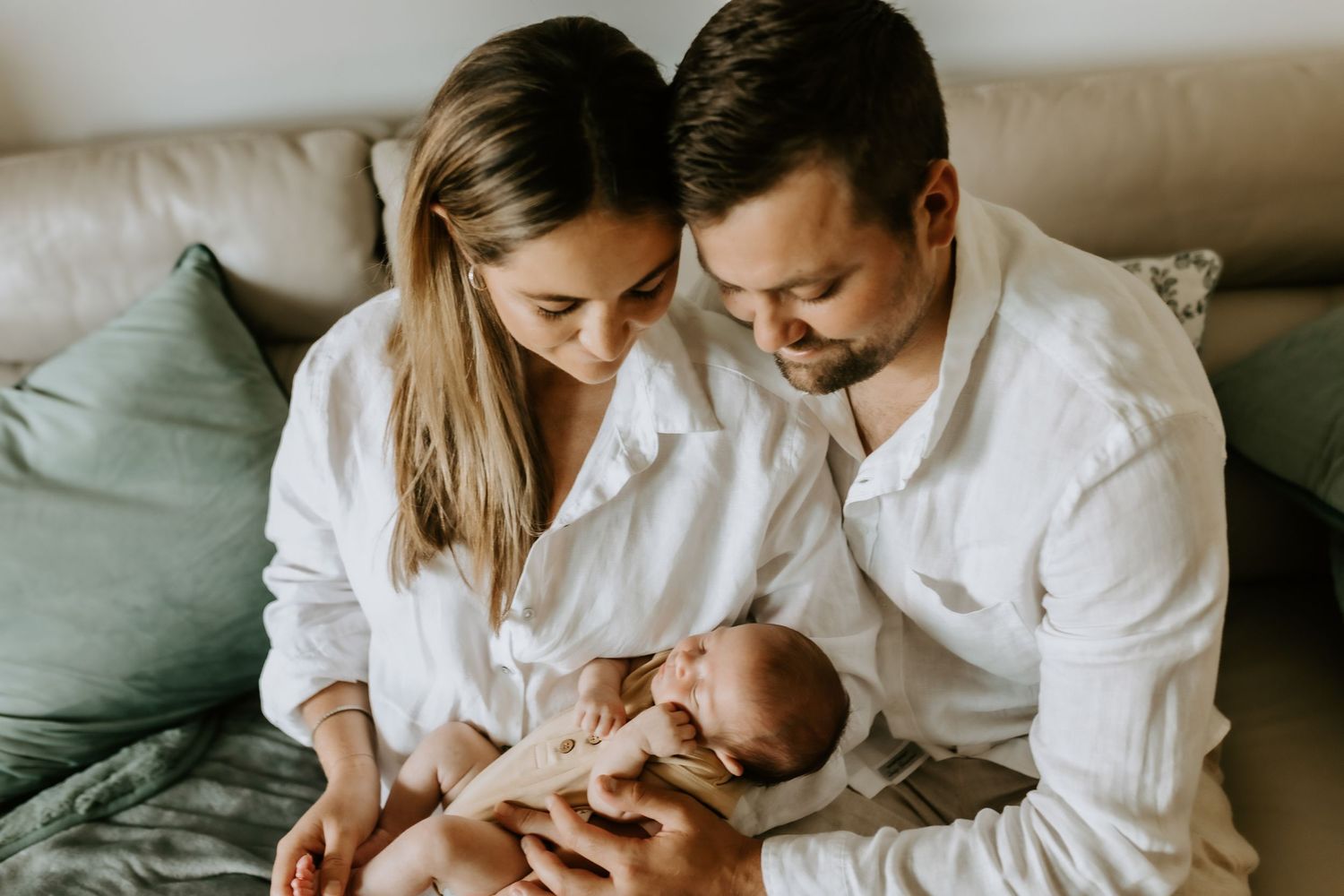 Intimate family moments captured in soft natural light during lifestyle photo session.