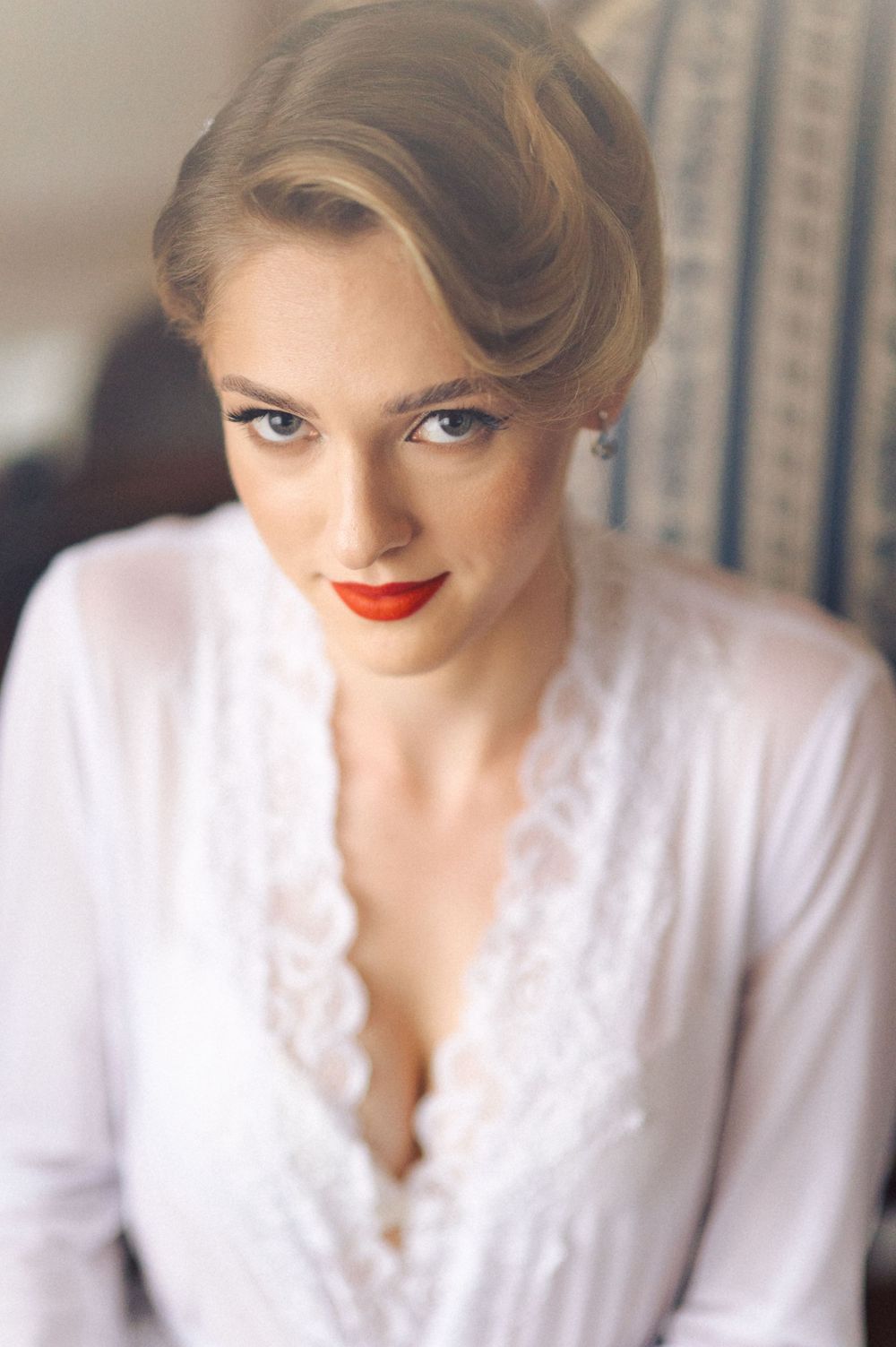 Vintage-inspired bridal portrait featuring classic makeup and elegant styling.