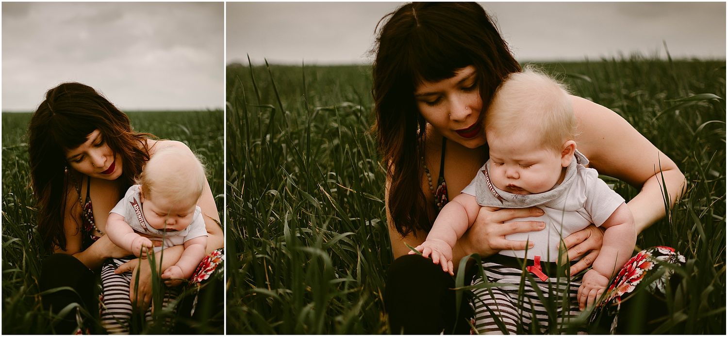 Artistic outdoor photoshoot featuring striped clothing and natural scenery.