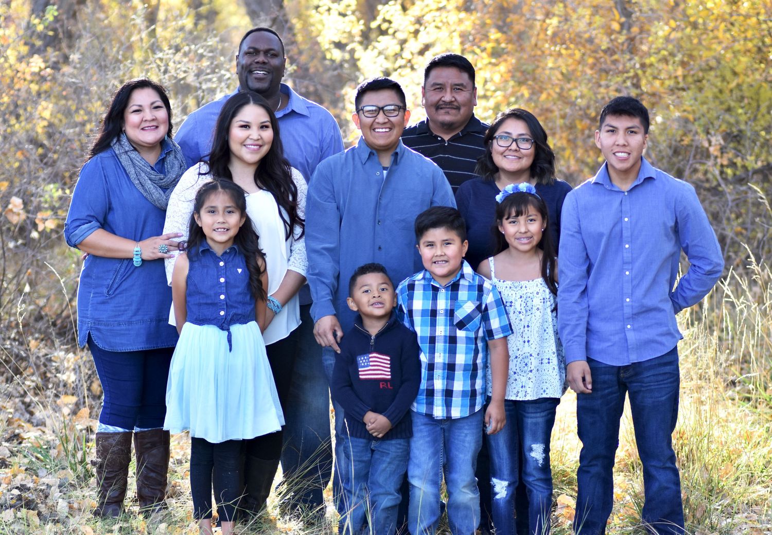 Large family smiling for pictures