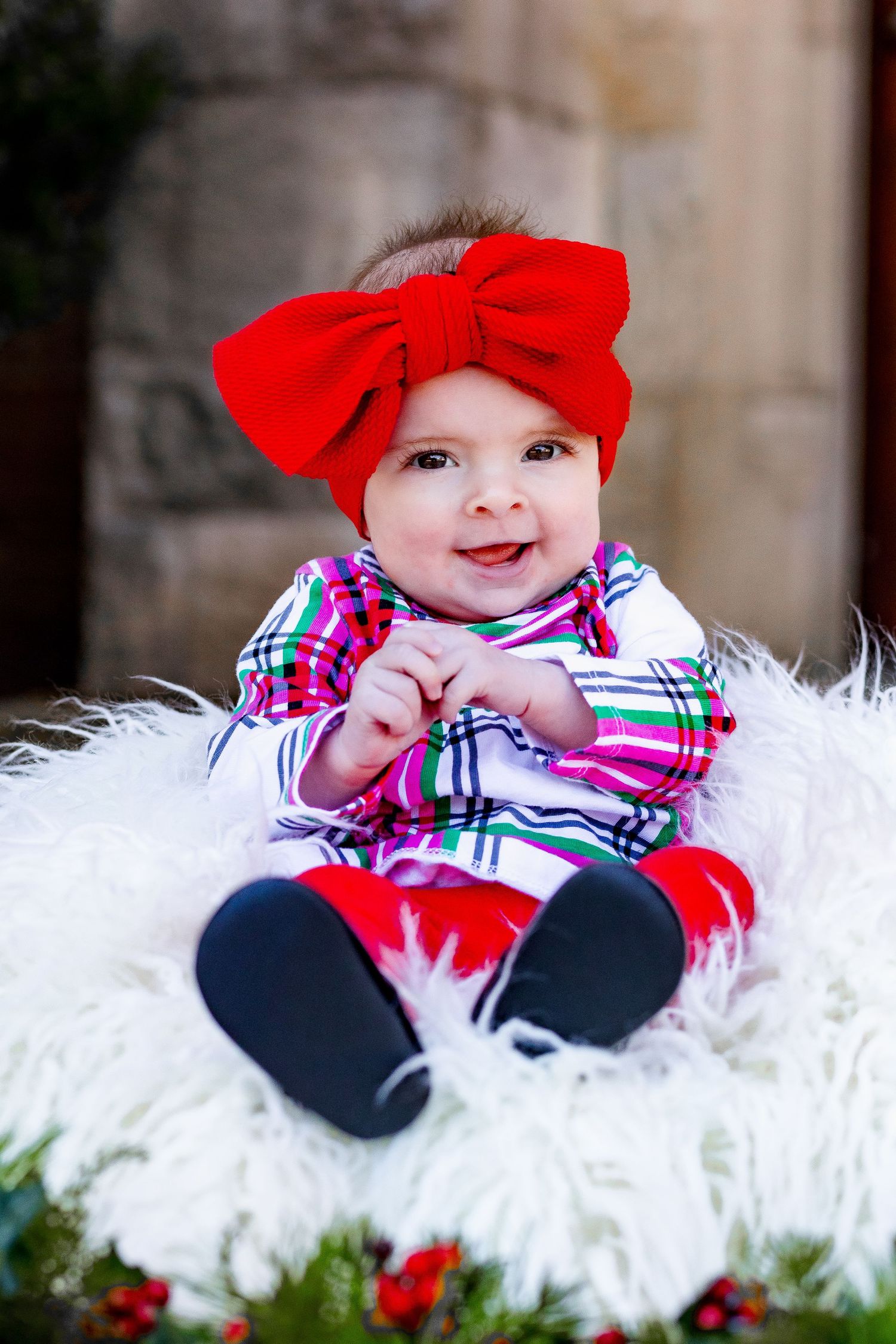 A baby celebrates her first christmas