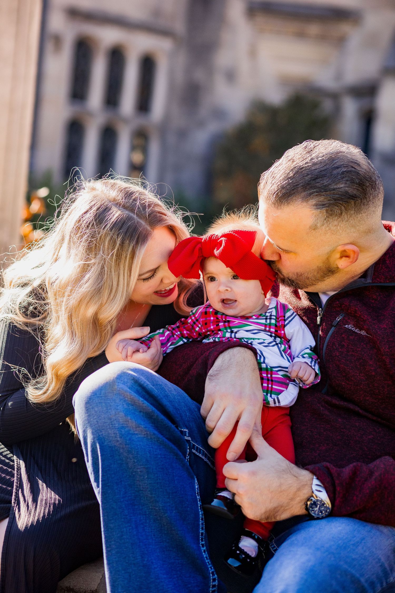 A family celebrates baby's first christmas