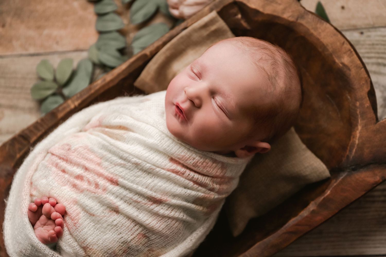 fine art portrait of baby girl in prop