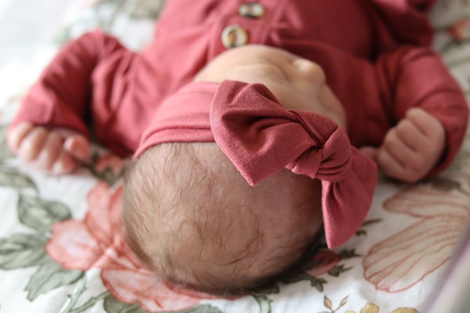 New born baby with hair Captured by Chelsee Rawe Photography