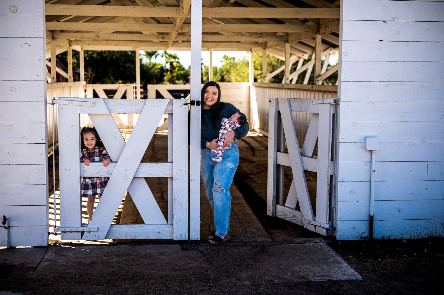 Rustic barn setting for a family photoshoot in Tucson AZ.