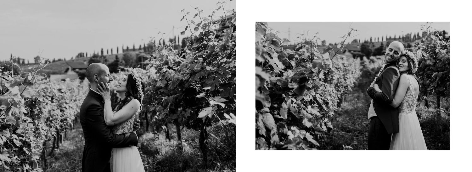 Black and white photo of bride and groom embracing tenderly in a vineyard on their wedding day.