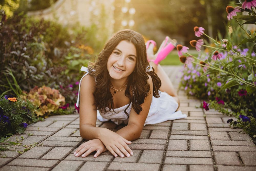 Lifestyle photography series with garden flowers and stone pathway in warm evening light.