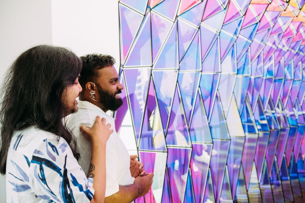 LGBTQ proposal in front of one way color tunnel at SFMoMA.