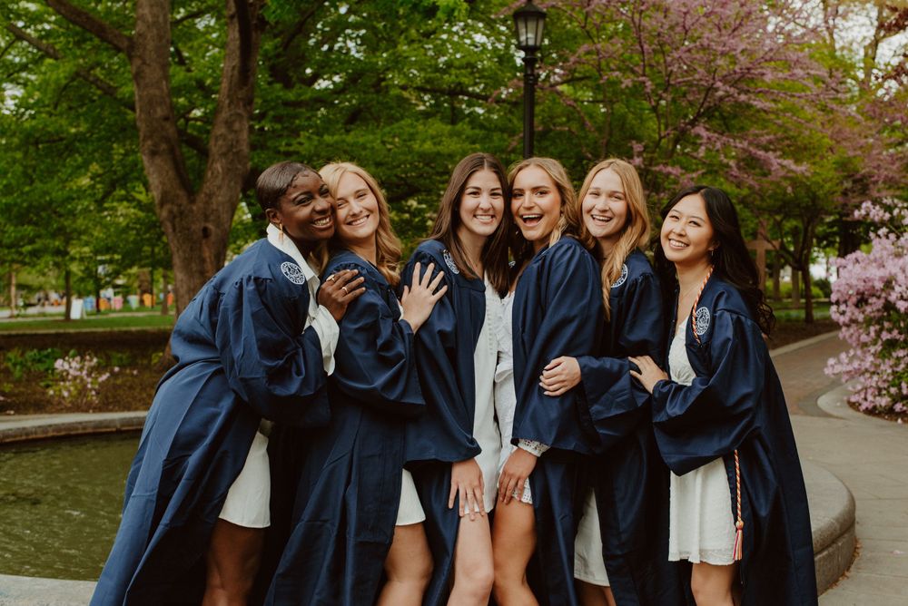 Candid moment laughing between college girl friends