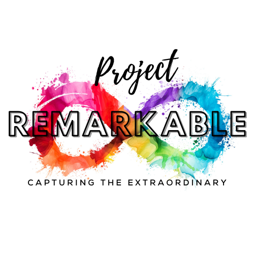 Colorful logo design for Project Remarkable with watercolor splashes and text.