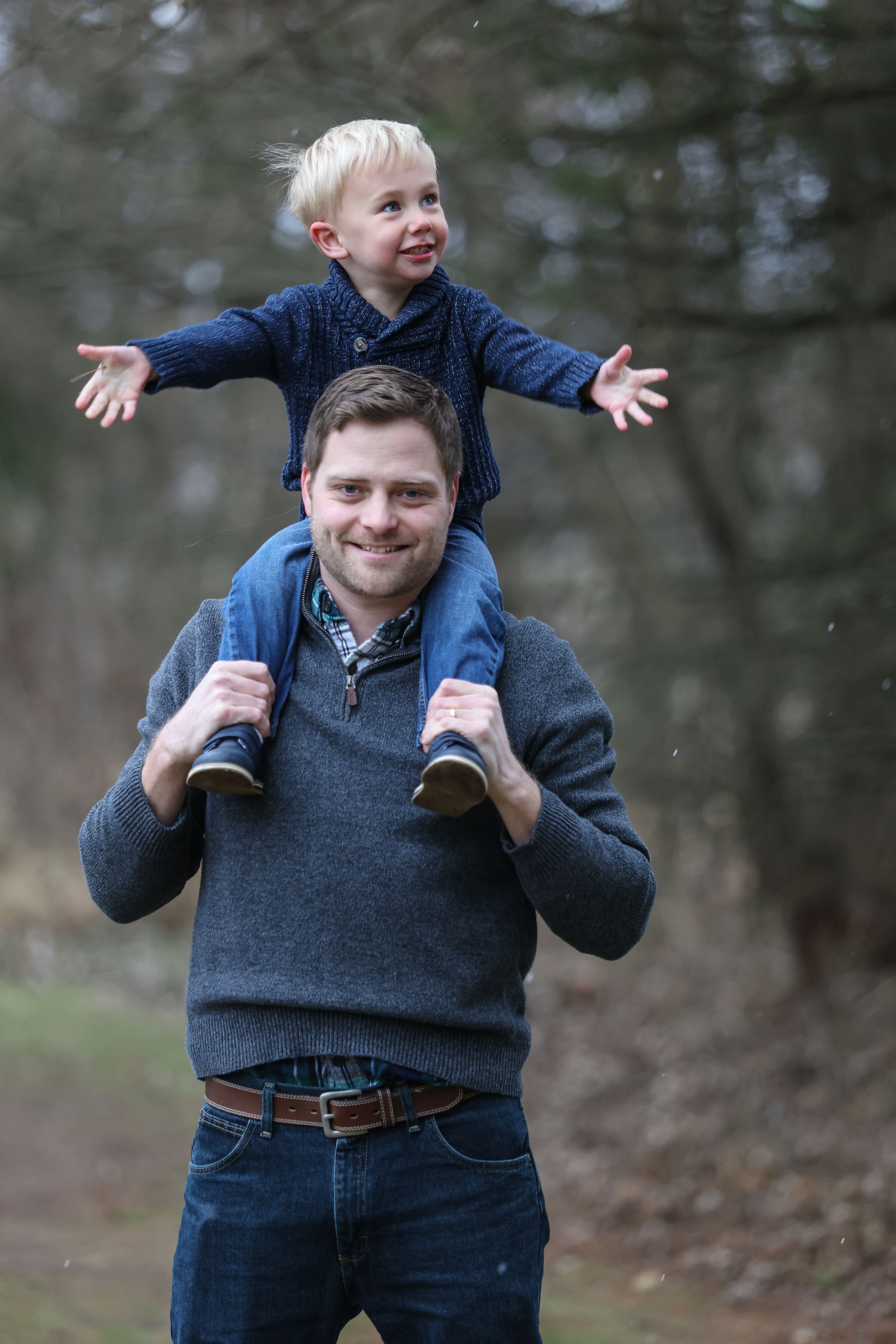 Playful outdoor portraits showing joyful expressions and interactions.