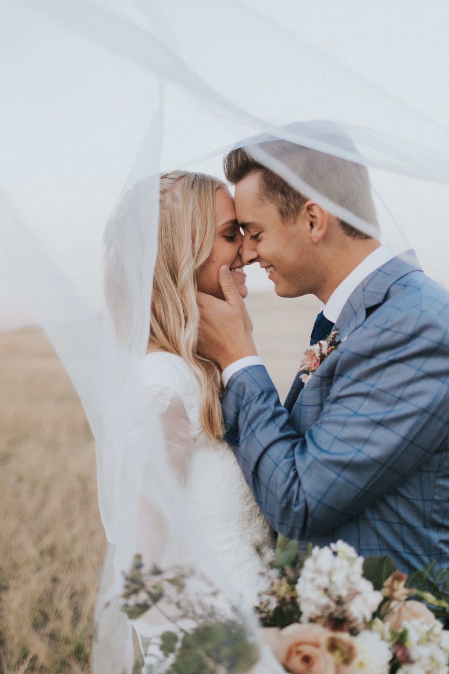 Experienced wedding photographer captures the first look and bridals for a utah couple near Tunnel Springs Park, Utah.