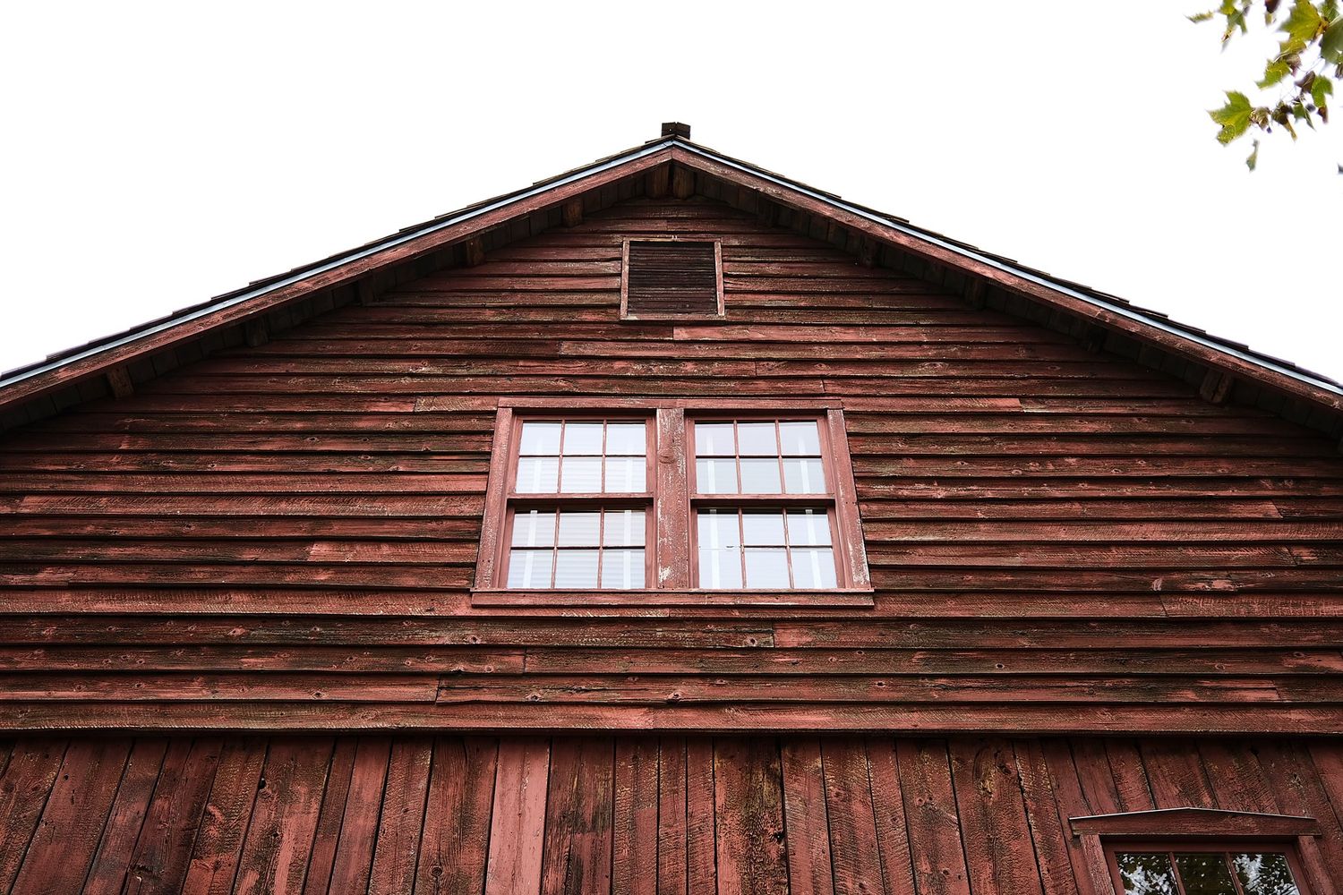 A rustic red barn
