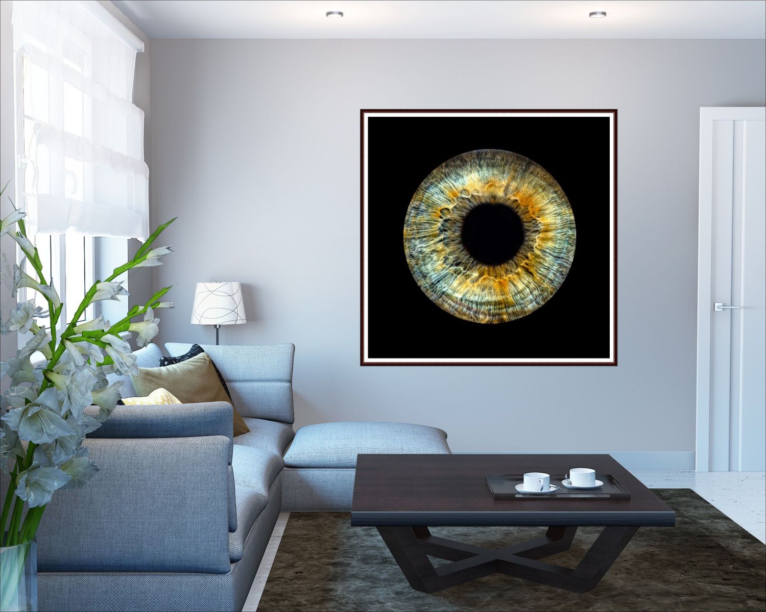 Modern living room interior featuring a large eye iris photograph artwork on a gray wall.