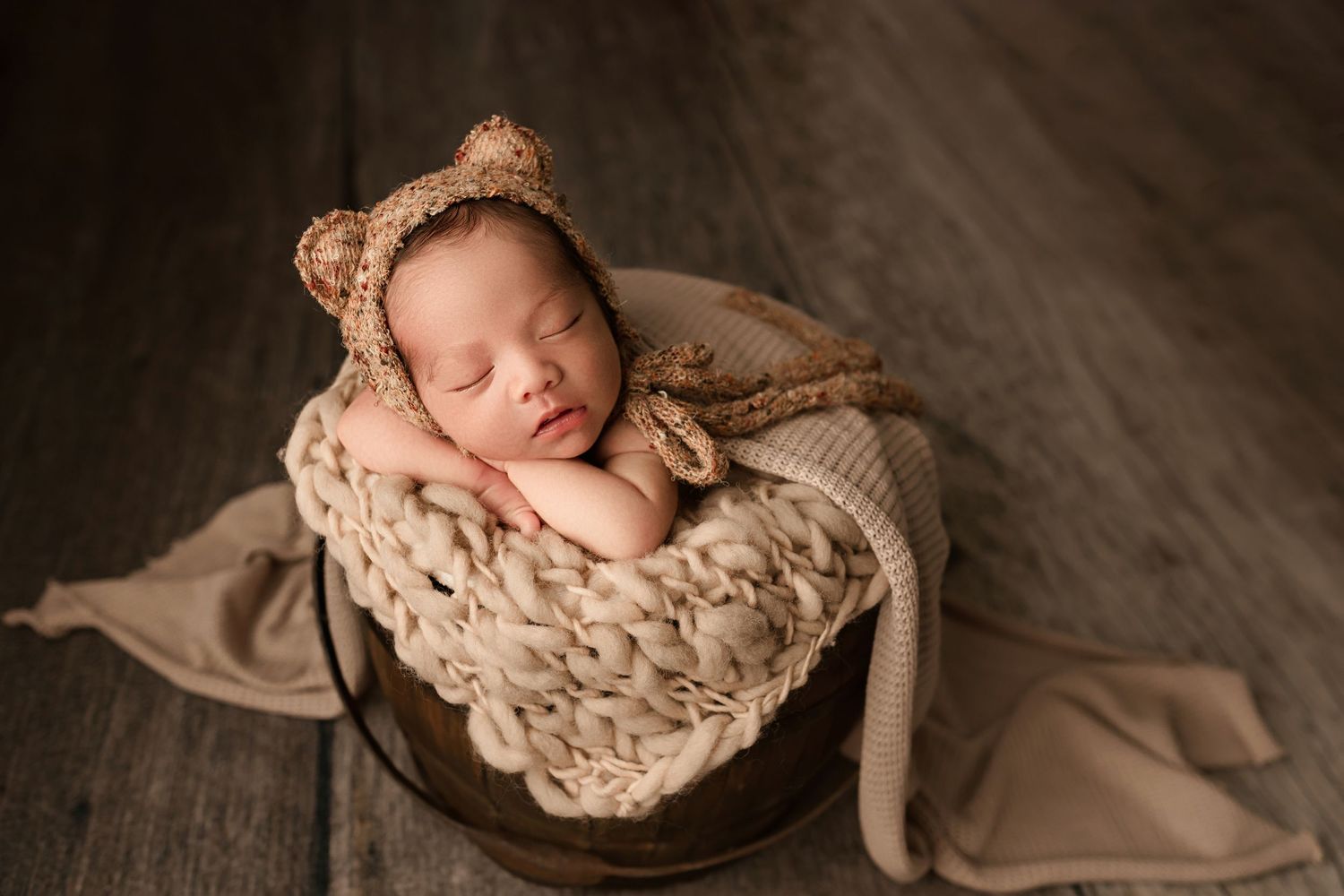 baby boy with bear bonnet in Moreno Valley ca newborn photography session