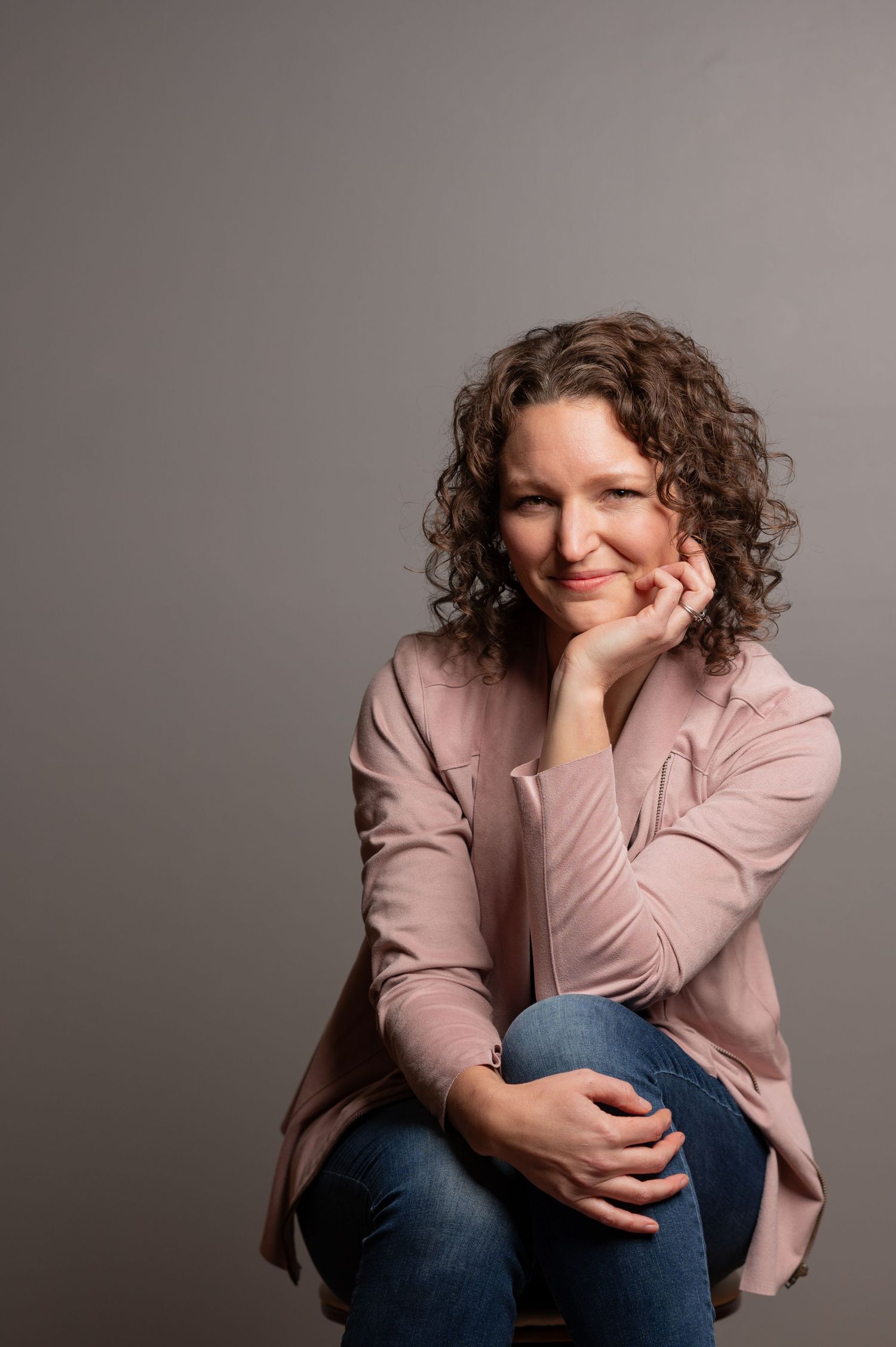Liz Grandy smiling at camera. Elizabeth Grandy Photography, Chelsea based photographer serving central Alabama