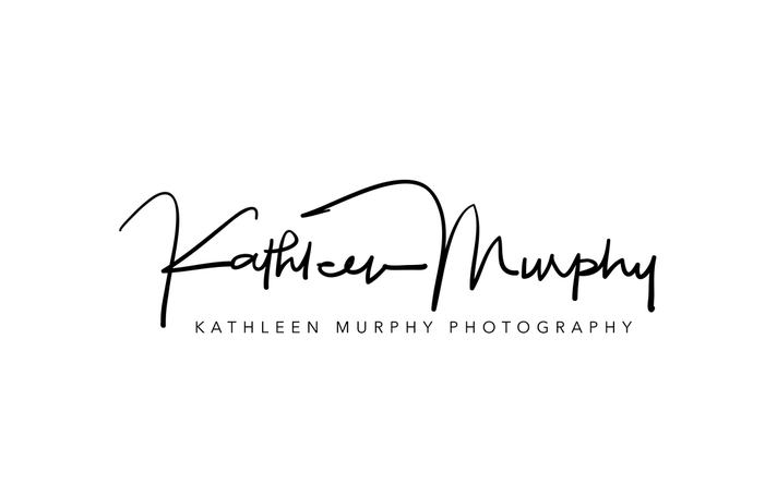 Black abstract minimalist logo design on dark background.