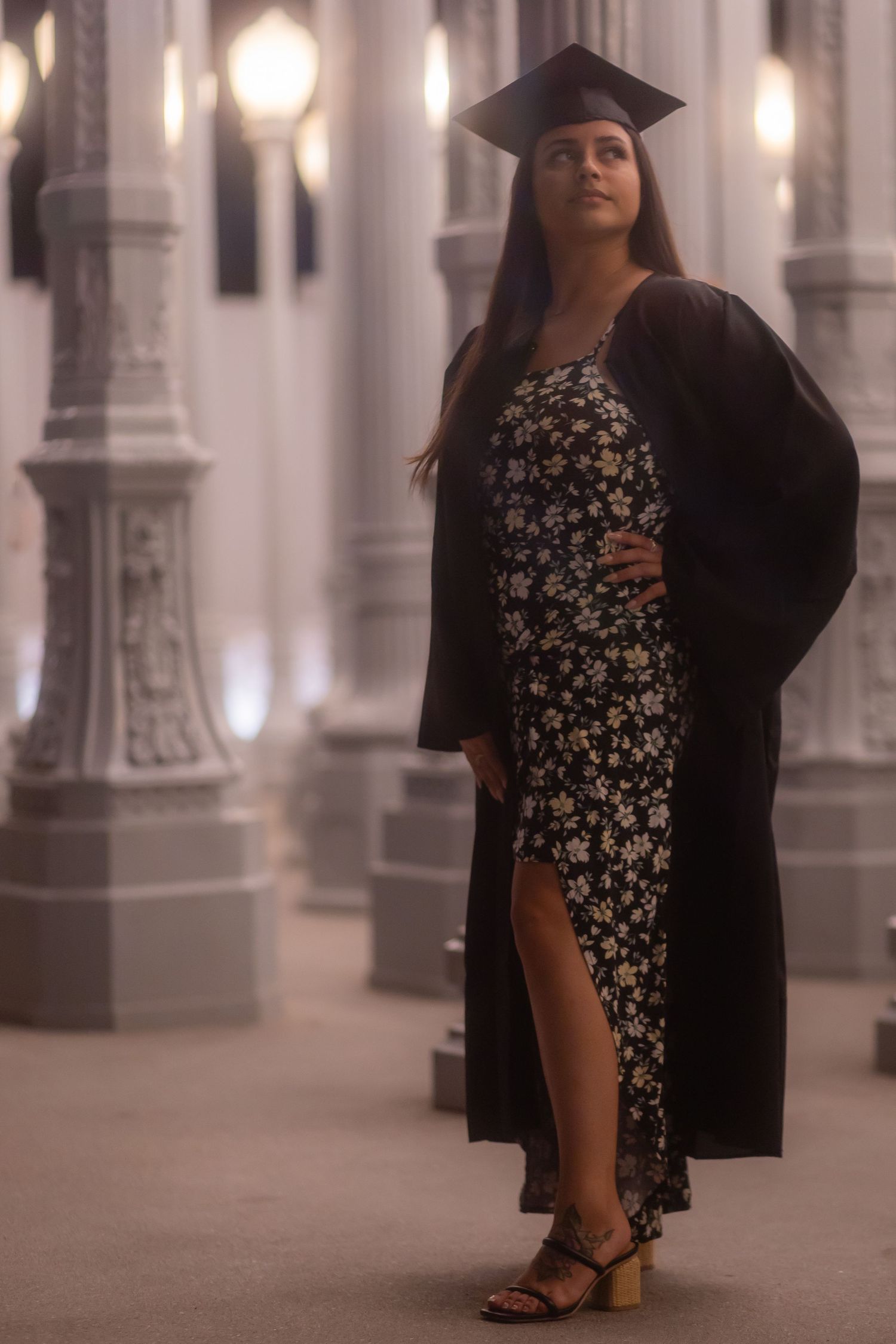 Graduation photoshoot shot at LACMA, a museum in Los Angeles County. Female graduate photographed with style and intent.